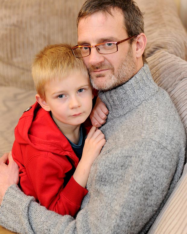 Derek Nash with his son Alex, 5, who has received an invoice and been threatened with a small claims court action after he didn't attend a children's birthday party.