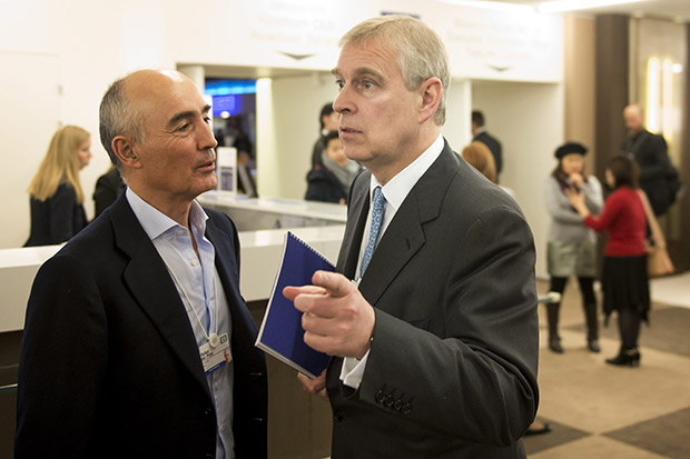 Britain's Prince Andrew, right, talks with Spanish businessman Rafael del Pino Calvo-Sotelo, left, during the 45th annual meeting of the World Economic Forum, WEF, in Davos, Switzerland, Thursday, Jan. 22, 2015. (