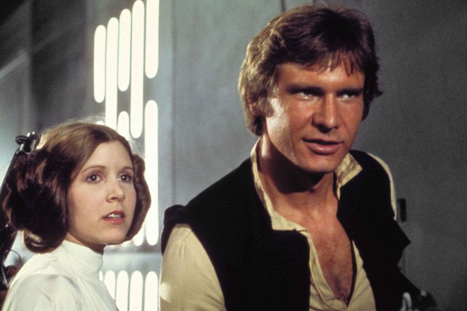 Carrie Fisher and Harrison Ford play Leia and Han in Star Wars film from 1977 