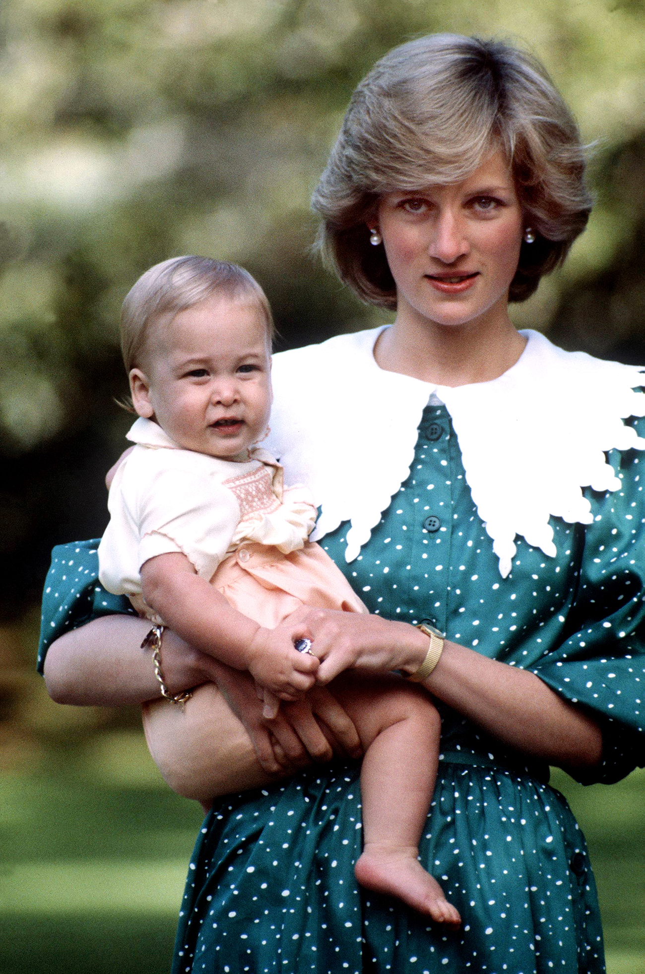 Princess Diana holding Prince William