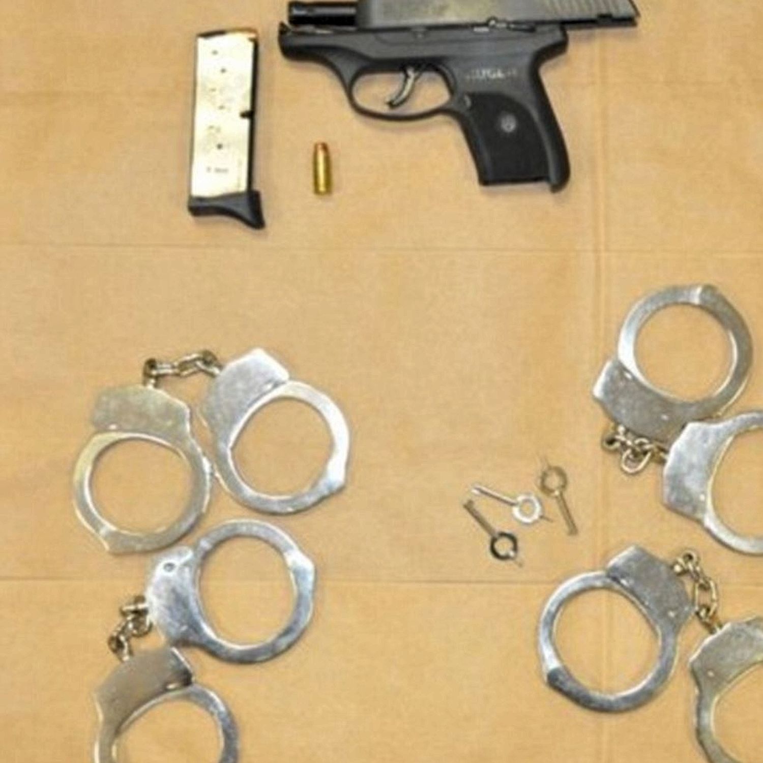 Killer's gun and handcuffs were also found