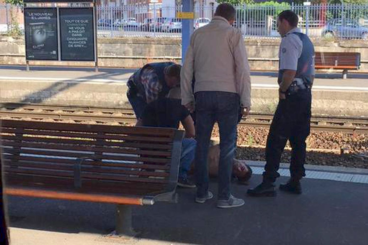 Arrest ... man is held on platform