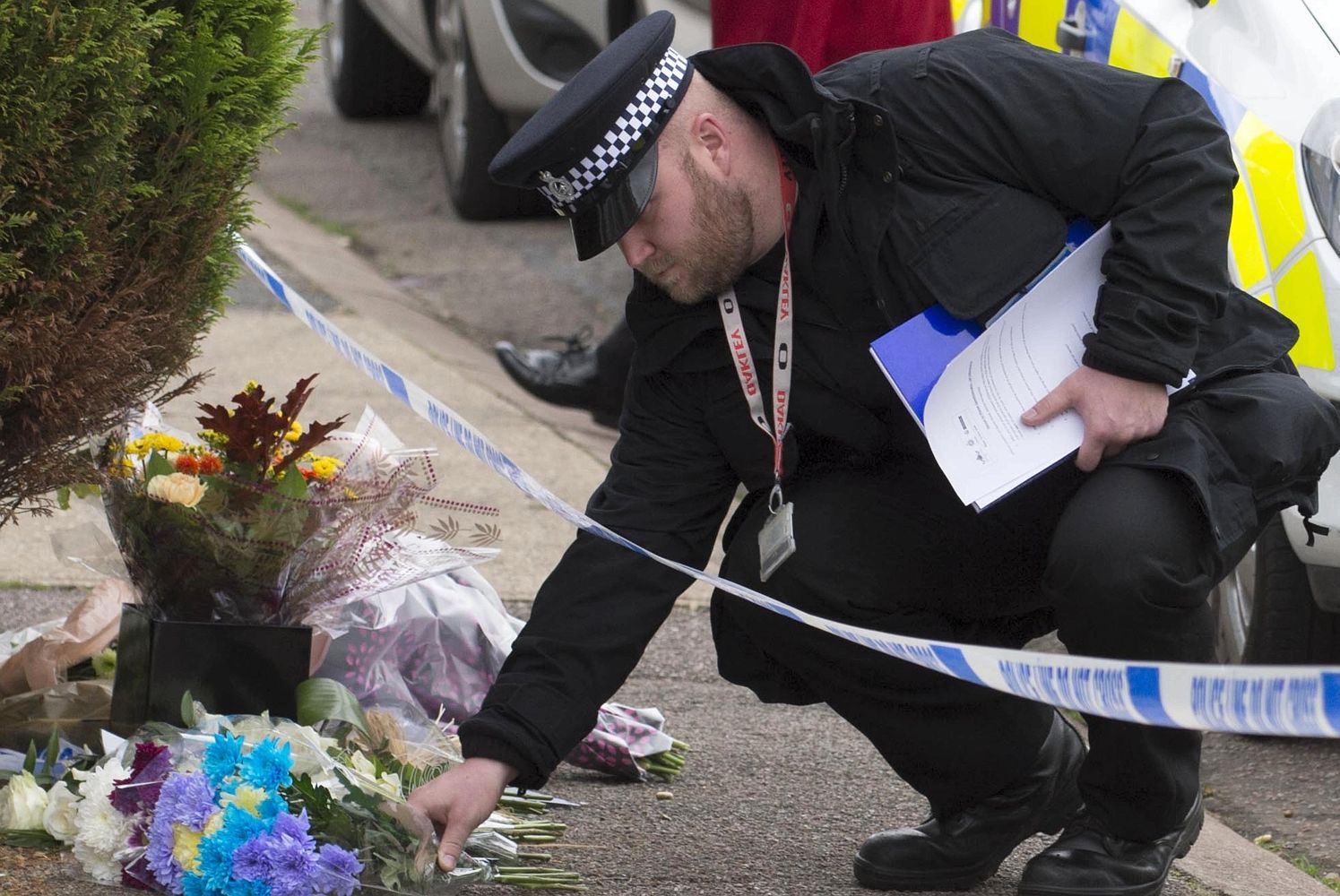 Flowers and messages from well wishers at the scene