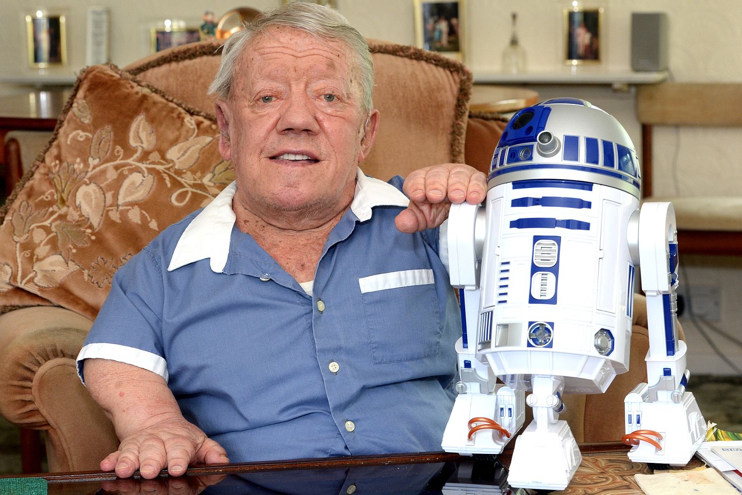 Kenny Baker plays droid R2-D2