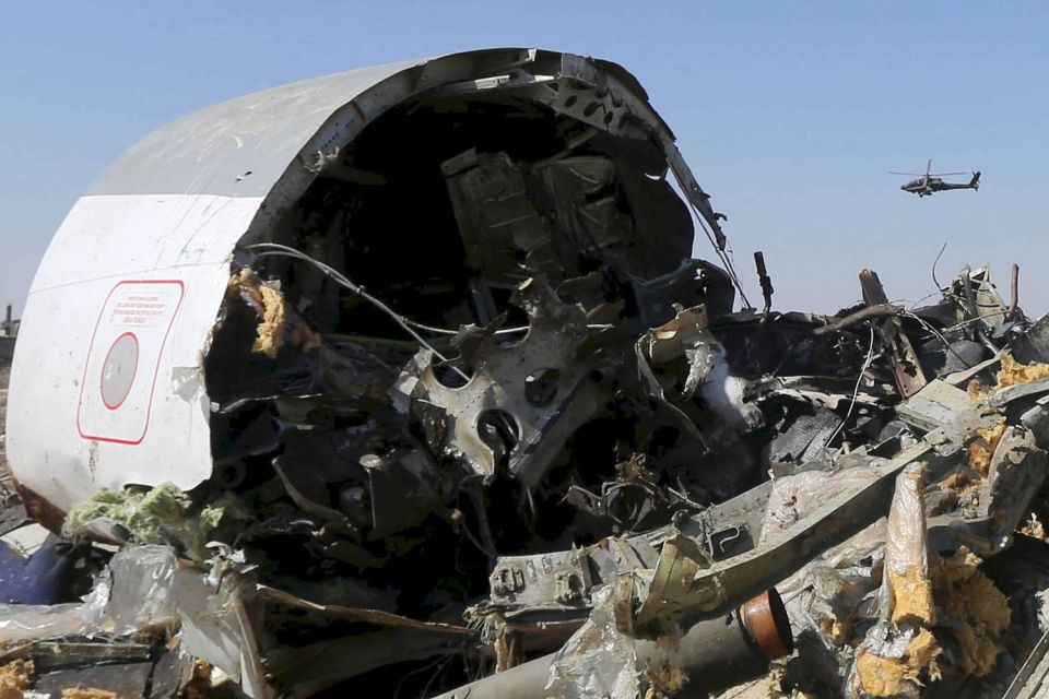 Bag handlers were being quizzed after British spies found evidence a bomb in the hold downed the Russian holiday jet 