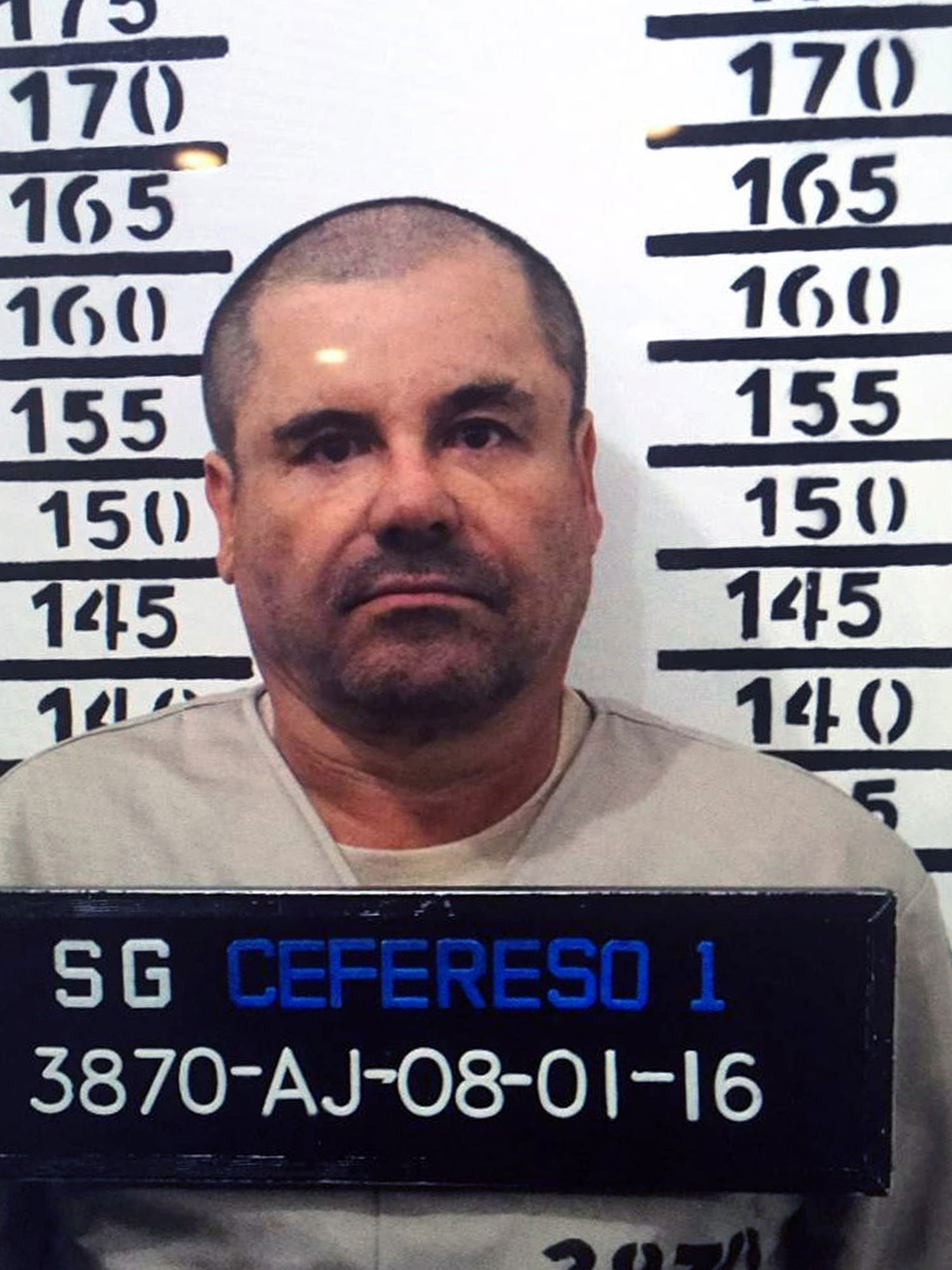 Handout police photograph of Joaquin Guzman Loera aka "El Chapo" taken on January 8, 2016, as he was imprisoned in Almoloya de Juarez, Mexico State. Mexican marines recaptured fugitive drug kingpin Joaquin "El Chapo" Guzman on Friday in the northwest of the country, six months after his spectacular prison break embarrassed authorities.