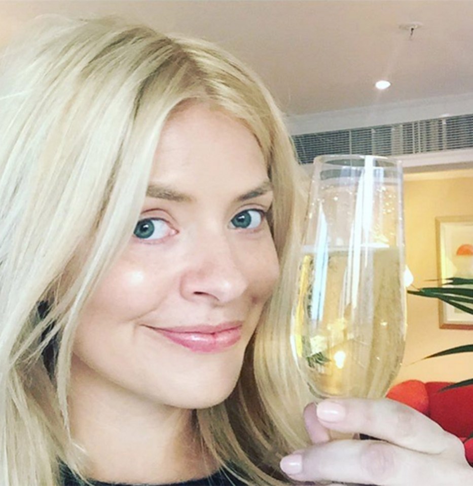  Holly Willoughby posed with a glass of wine