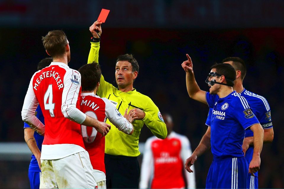 Per Mertesacker is shown the red card by Mark Clattenburg after bringing down Diego Costa 