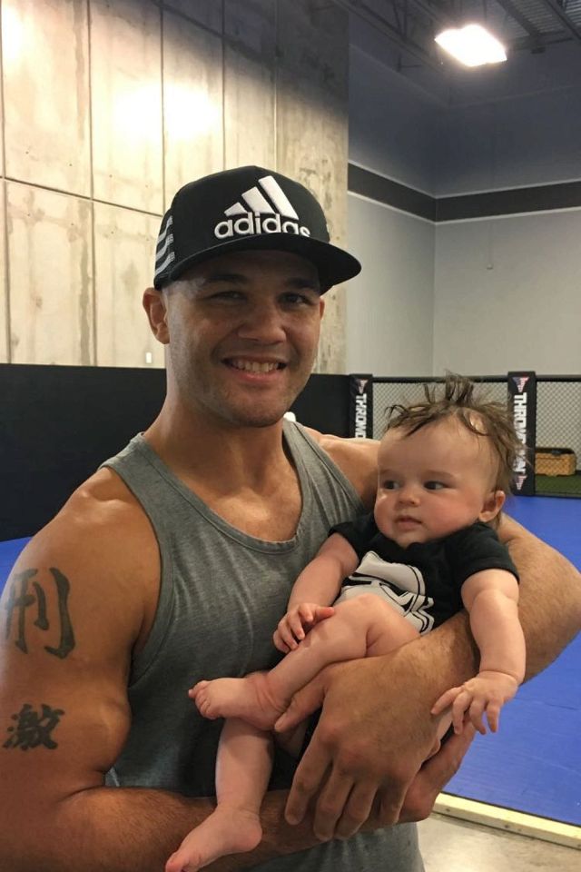  Young Buddy Pickett with UFC welterweight champ Robbie Lawler