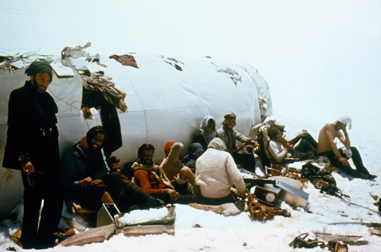 MENDOZA, ARGENTINA - NOVEMBER 26: (FILE) Survivors pose for a picture in the plane's tail on November 26, 1972 in Mendoza, Argentina. On October 13th of 1972 a plane carrying the Uruguayan rugby team Old Christians to Santiago de Chile crashed in the Andes. 29 people died, including players and relatives, and only 16 survived under the most extreme conditions: hunger, temperatures up to 30 degrees below zero and isolation. Eleven days after the accident, they heard in the radio that the search had been stopped and they were presumed dead. Determined not to let themselves die, on December 12th, Nando Parrado, Roberto Canessa and Antonio Vizintín decided to leave the plane and find some help. They walked ten days and 55 kilometers to the west in the snow until mule driver Sergio Catalan found them on a riverside. On December 23th and after 72 days of isolation in the mountains, the survivors were rescued by the Air Rescue Service. This story was taken to the cinemas when in 1993 the movie ¿Alive¿ was presented. Nowadays the survivors give lectures on survival and leadership, telling their story and sharing their experience worldwide.