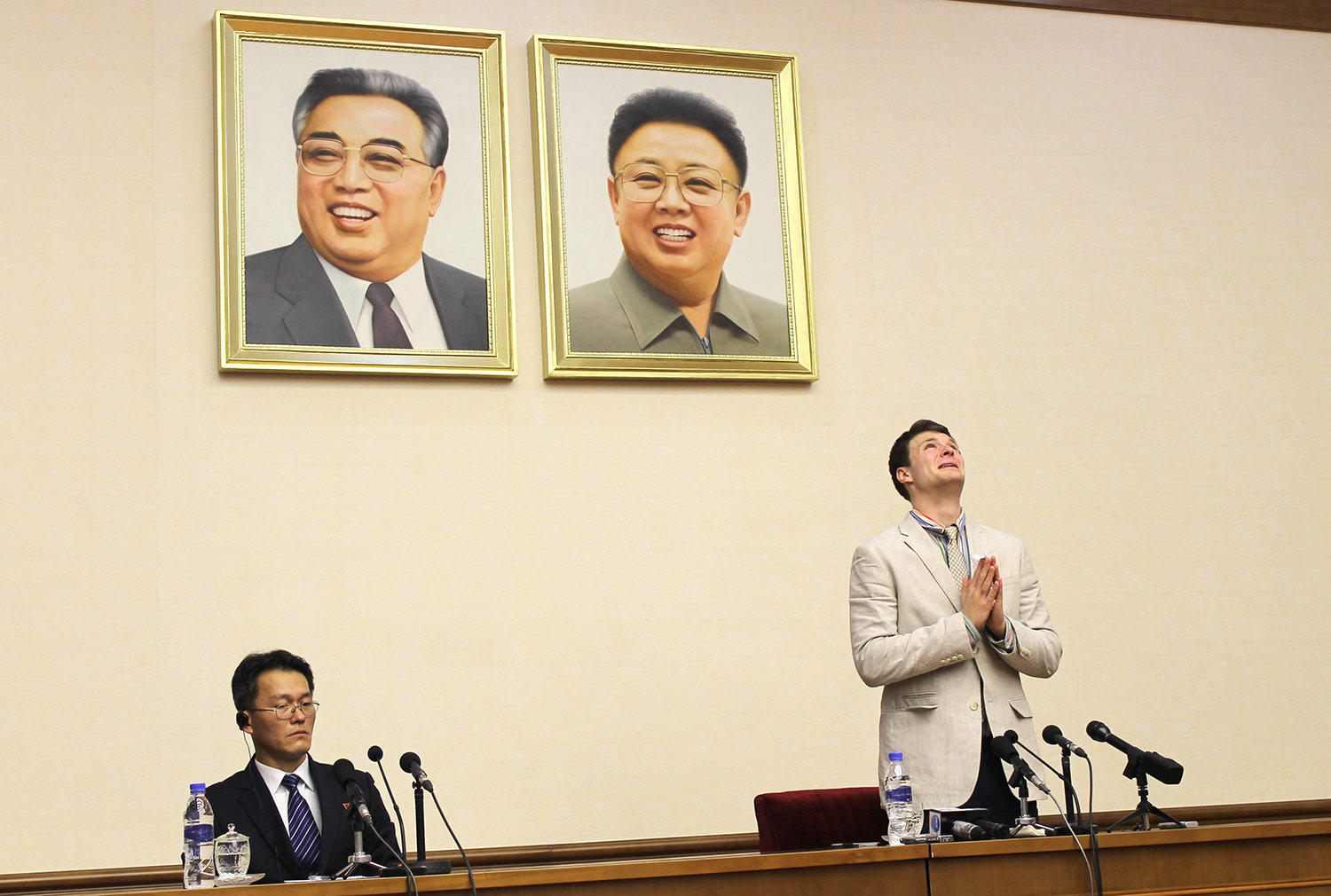 American student Otto Warmbier, right, is presented to the reporters on Monday, Feb. 29, 2016, in Pyongyang, North Korea