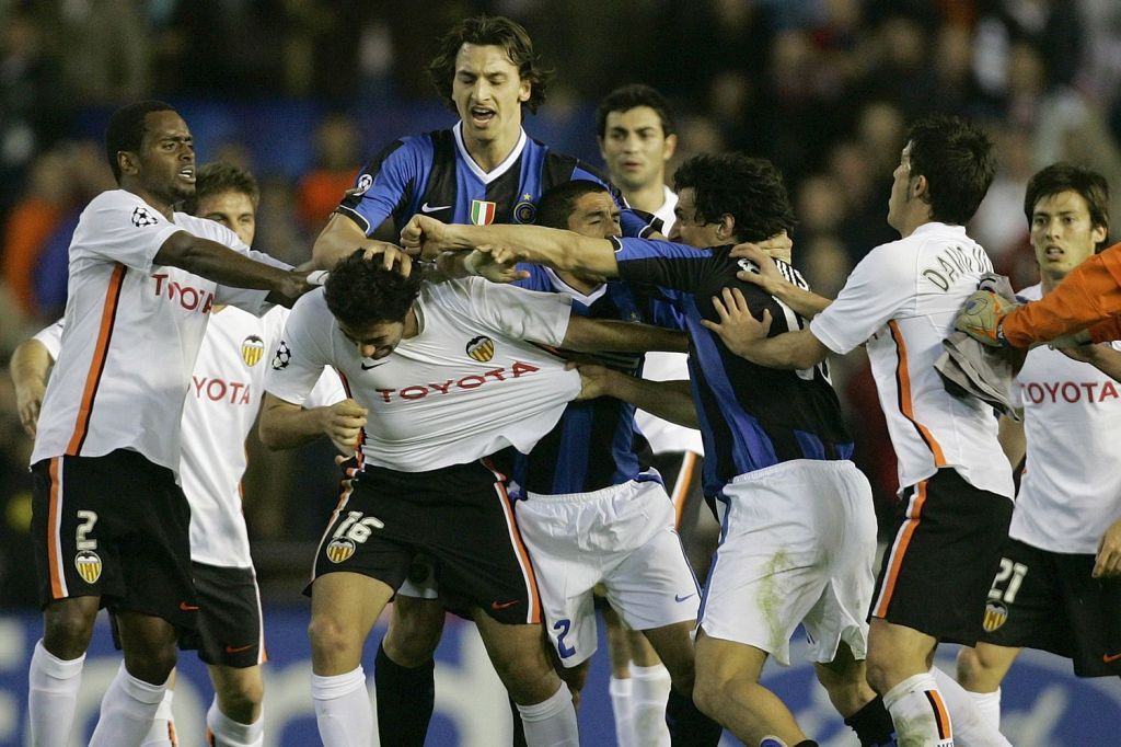  Zlatan Ibrahomvic is at the forefront of a post-match brawl between Valencia and Inter players after Euro elimination