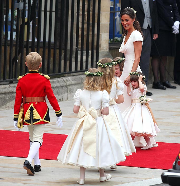 Page boys and bridesmaids arrive at Westminster Abbey, London, escorted by Pippa Middleton before her sister, Kate's, marriage to Prince William.