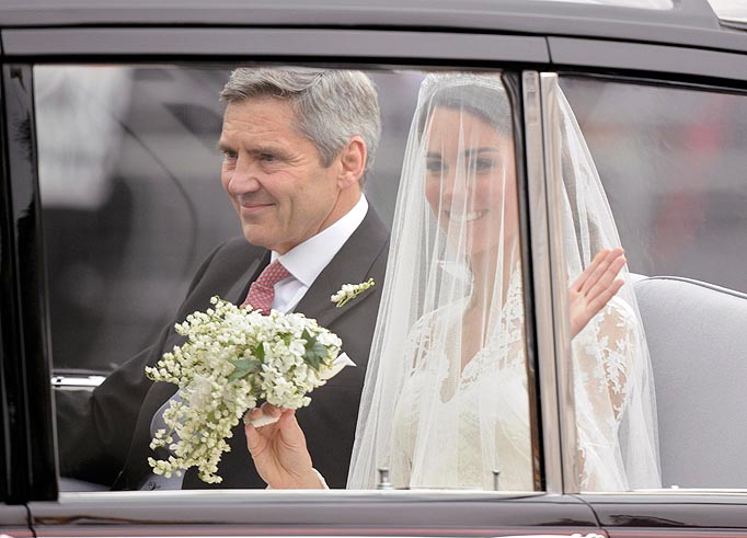 Kate Middleton and her father, Michael, travel in a Rolls Royce to Westminster Abbey for Kate's marriage to Britain's Prince William,