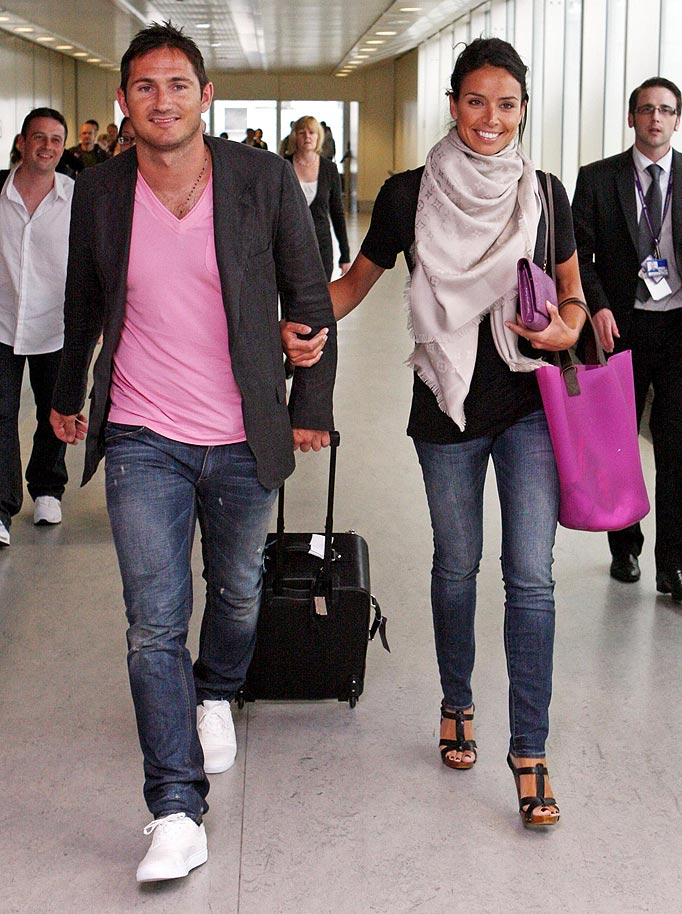 Christine Bleakley and Frank Lampard walk through Terminal 3 at Heathrow Airport after returning from Los Angeles where she accepted his marriage proposal.