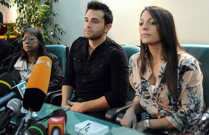 Meredith Kercher's mother Arline (L), brother Lyle (C) and sister Stephanie (R), listen to questions from the media during a press conference in Perugia, Italy, 04 October 2011.