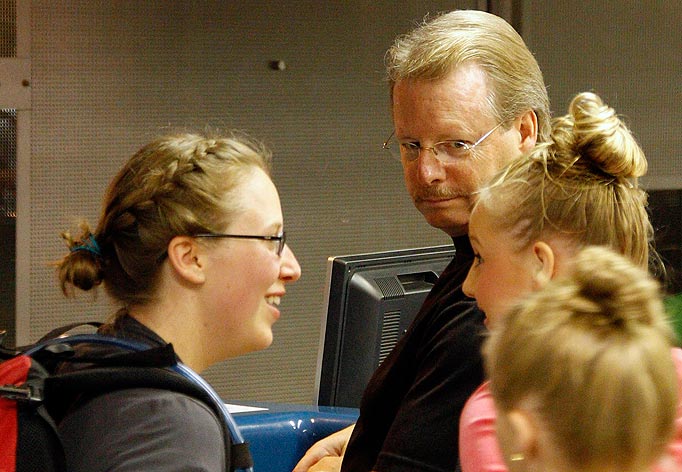 Amanda Knox's father Curt Knox, center back, and other members of the family check in at Rome's Leonardo da Vinci airport Tuesday, Oct. 4, 2011. Amanda Knox was leaving Italy a free woman Tuesday, the morning after an Italian appeals court dramatically overturned the American student's conviction of sexually assaulting and brutally slaying her British roommate. The Italy-US Foundation, which has championed Knox's cause, said the American was at Leonardo da Vinci airport in Rome boarding a flight to London, where she will catch a connecting flight to the United States.