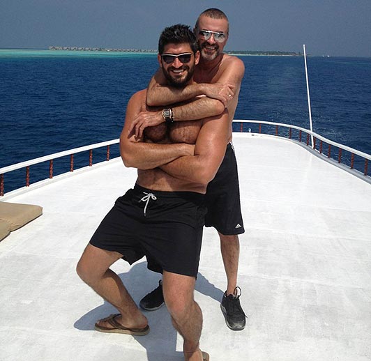 George and boyfriend Fadi Fawaz in happier times