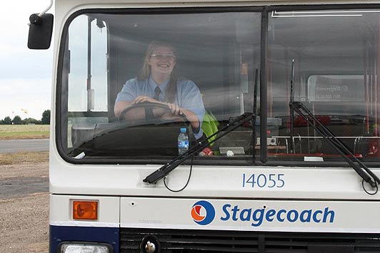 Collect of unlucky Hazel Loveday driving a bus. Hazel dropped out of the Euro Millions syndicate.