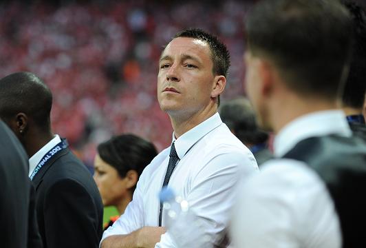 WATCHING DUTY ... suspended Chelsea captain John Terry looks on ahead of the match