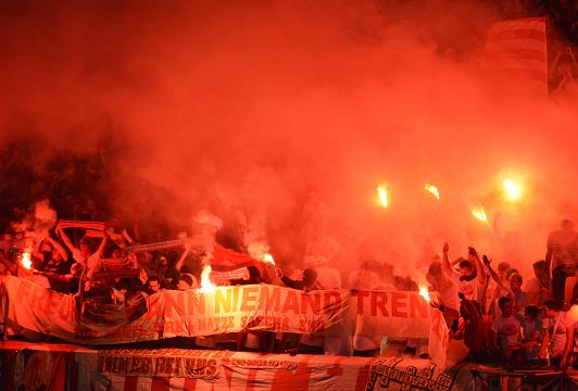 FLARE PLAYERS ... Bayern fans get into the mood ahead of the second half