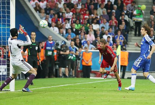 MULLERED ... Bayern Munich forward Thomas heads his side in front