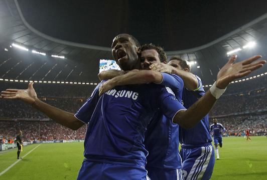 GOTTA HAND IT TO 'EM ... Didier Drogba celebrates his leveller