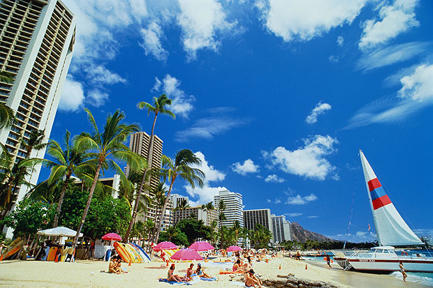  Spot the difference... The beach at Oahu in Honolulu, Hawaii will be cooler than parts of the UK by Tuesday, it is predicted