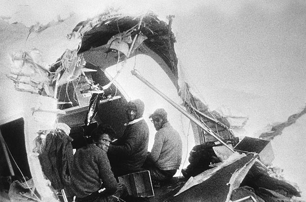 Survivors pose for a picture in the plane's tail on December, 1972 in Mendoza, Argentina