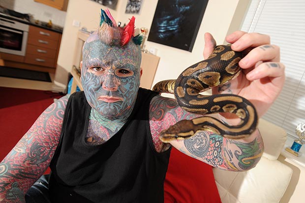 Britains most tattooed man has spent 300 hours in the chair, spent roughly £20,000 on ink and has legally changed his name to Body Art. Born Mathew Whelan, the 33-year-old says body modification is a culture, a way of life and almost a religion