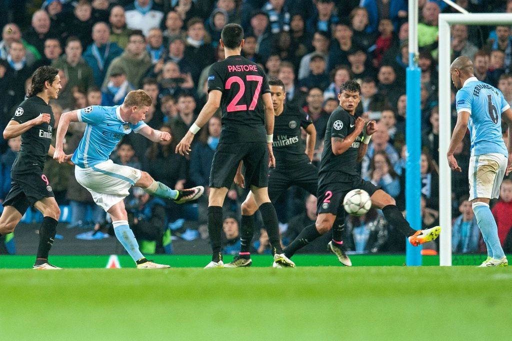  Kevin De Bruyne's curls an effort around the Paris Saint-Germain defence to send Manchester City through