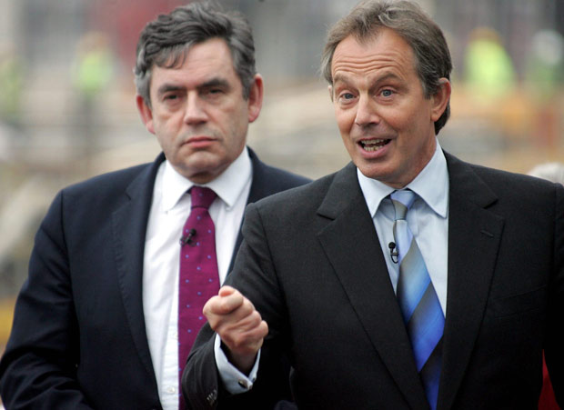  Tony Blair (R) accompanied by the Chancellor of the Exchequer, Gordon Brown 