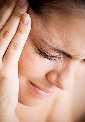 PAINFUL ... Experts say brains could be at risk from migraines