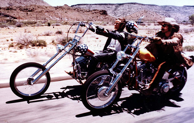 Headline: Biking, it's hell on wheels
Caption: Get your motor running, head out on the highway: Peter Fonda and Dennis Hopper in the cult road movie Easy Rider, which spawned several freedom-loving generations of motorcyclists around the world