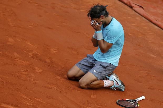 Rafael Nadal reacts after seeing Novak Djokovic's double fault