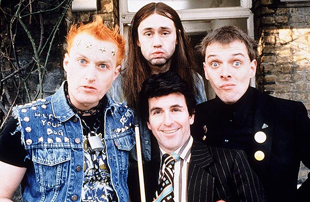 Adrian Edmondson, Nigel Planer, Christopher Ryan and Rik Mayall in the Comedy Television series The Young Ones