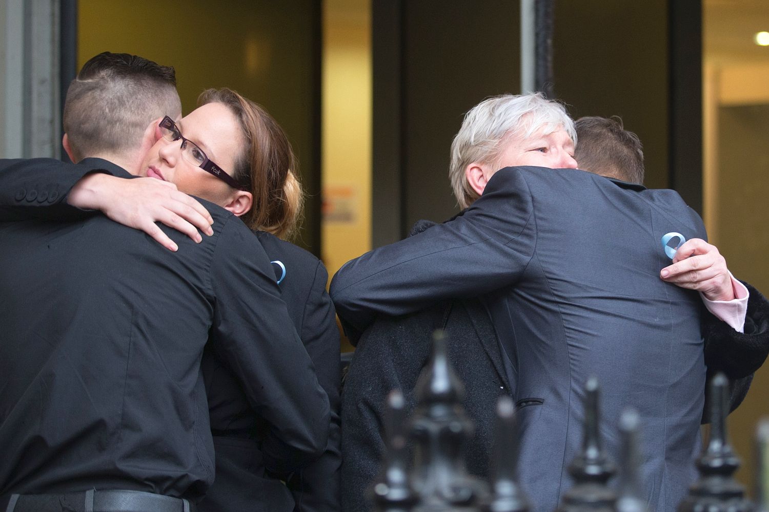 Becky's family embrace outside court