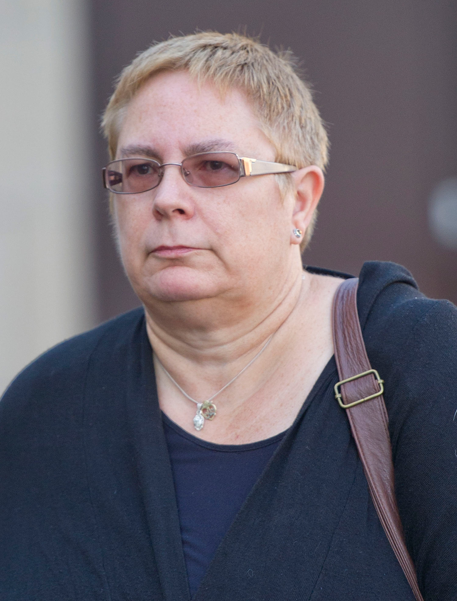 Nurse Theresa Taylor, 55, who is on trial for the manslaughter of six-year-old Jack Adcock, arrives at Nottingham Crown Court.