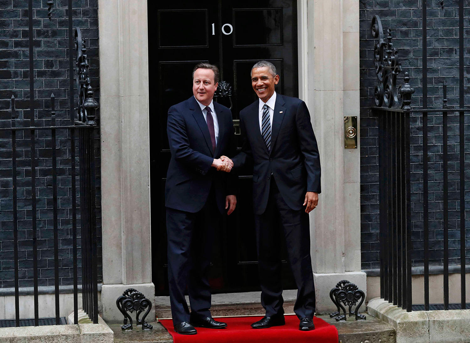 Barack Obama is greeted by Britain's Prime Minister David Cameron at Number 10 Downing Street in London, Britain April 22, 2016.