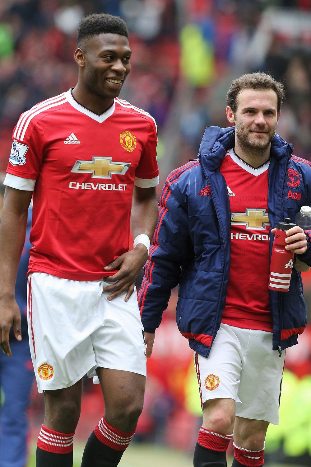 Plaudits ... Timothey Fosu-Mensah, pictured left alongside team-mate Juan Mata, has begun to carve a name for himself since making his Manchester United debut earlier this year