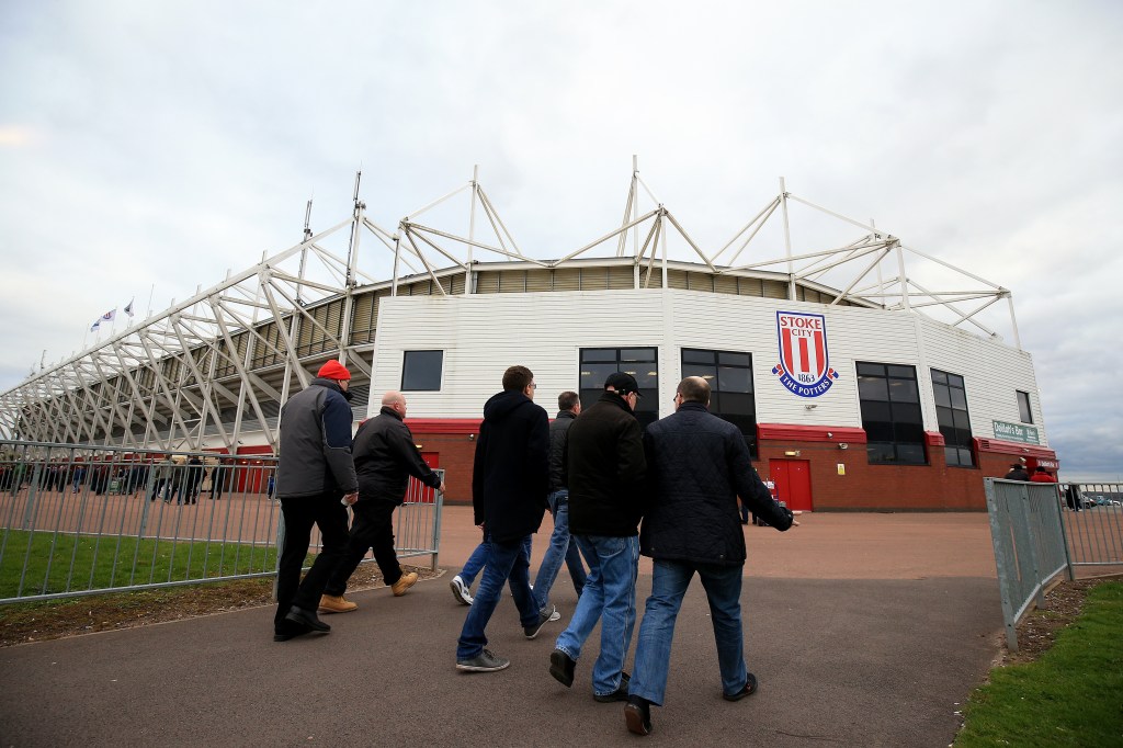  Potters supporters make their way over to the Britannia Stadium