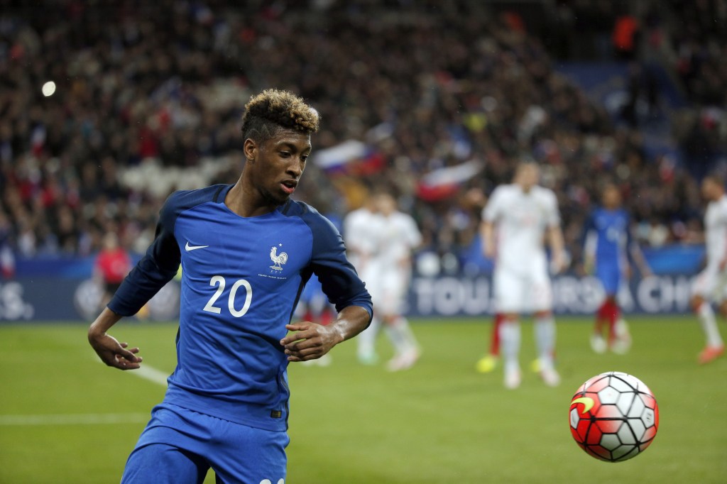  Frances Kingsley Coman watches the ball during the international friendly soccer match between France and Russia in Saint Denis, north of Paris, France, Tuesday, March 29, 2016. (AP Photo/Thibault Camus)