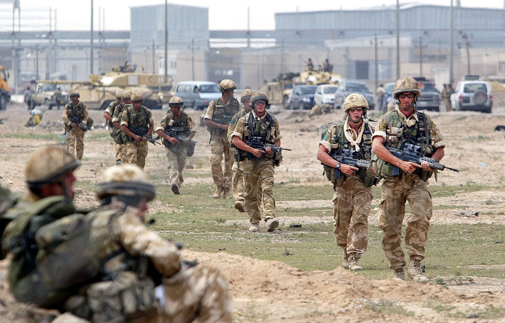 British soldiers patrol the area around the University of Basra while fighting continues in Iraq in April 2003