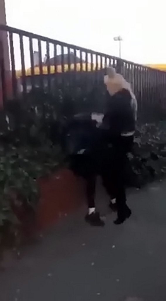  The horrific footage shows a blonde teeanger raining punches and kicks down on a terrified Ellie