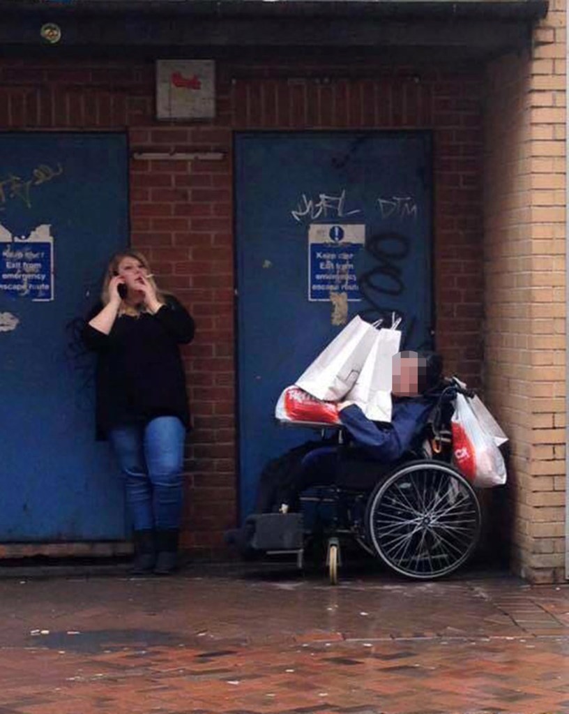  Emma Price was snapped smoking next to the severely disabled pensioner in her care outside a shopping centre in Leicester