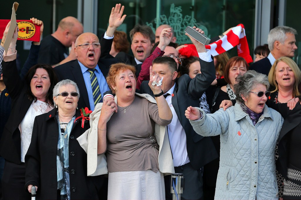  Families outside court after a jury decided that the 96 Liverpool fans who died in Britain's worst ever sporting disaster, were unlawfully killed, with police failures to blame