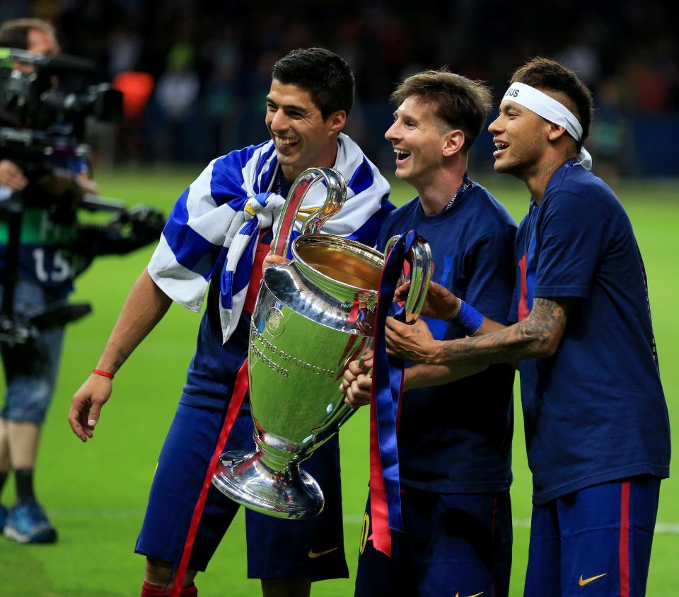  Luis Suarez, Neymar and Lionel Messi with 2015 Champions League trophy