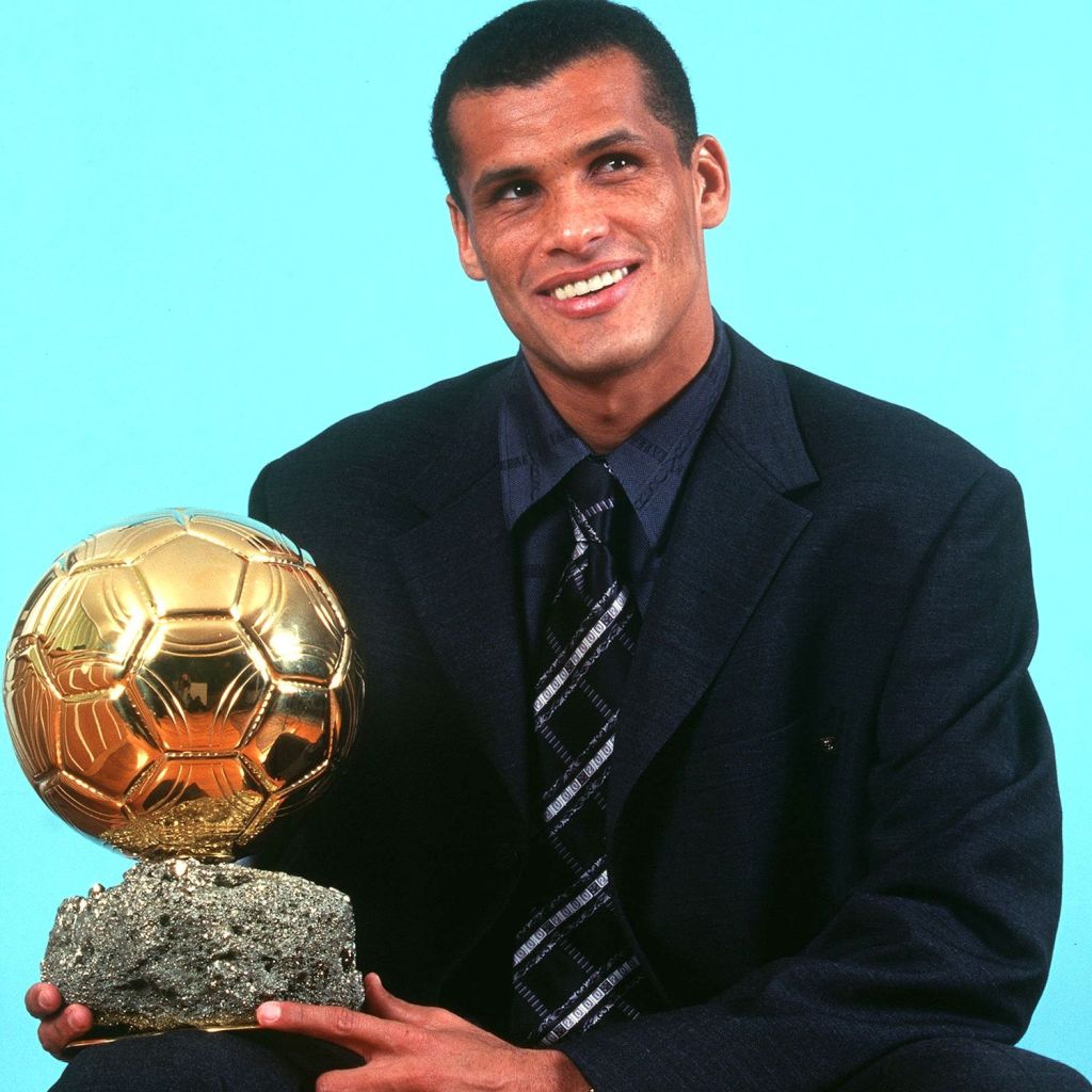  Rivaldo poses with the Ballon dOr he won while at Barcelona in 1999