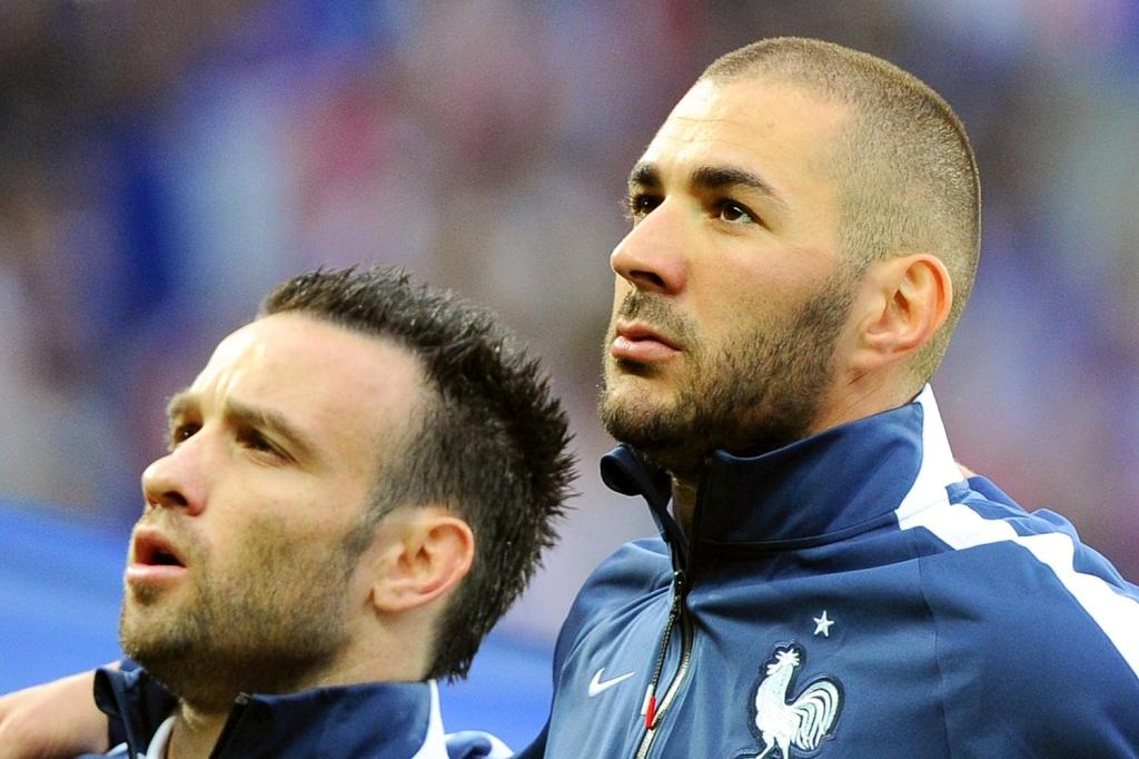  Matheu Valbeuna and Karim Benzema line up for France before the sex-tape controversy began