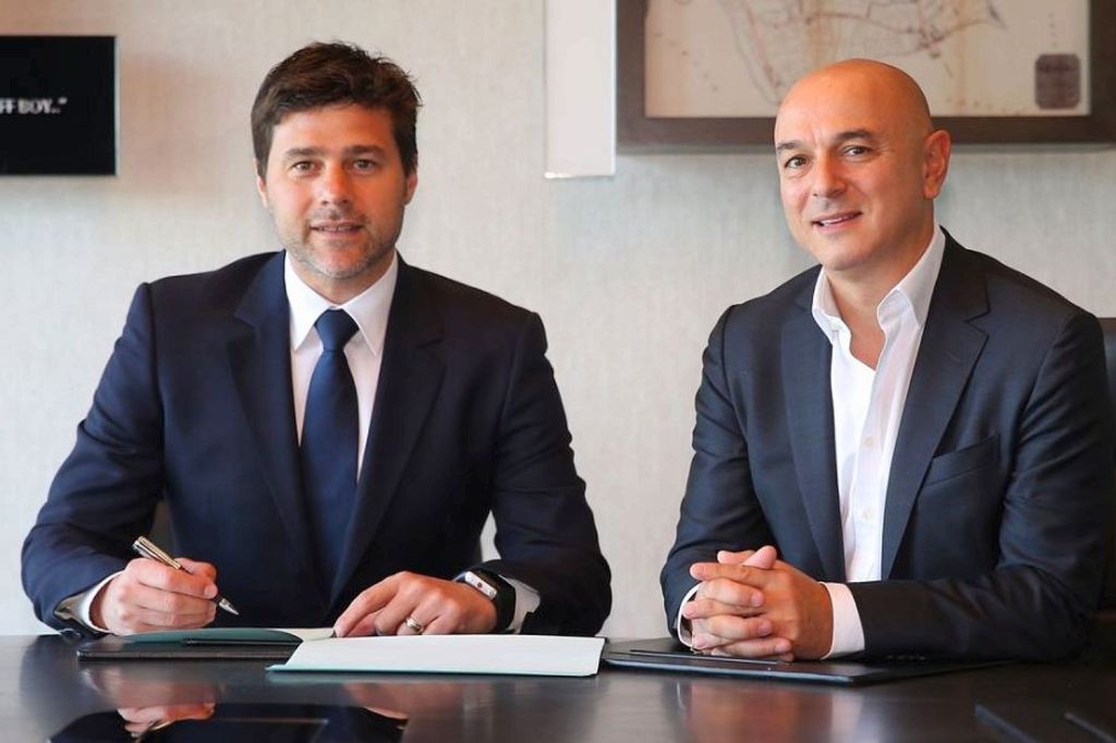  Mauricio Pochettino, alongside Daniel Levy, puts pen-to-paper on a new contract at Spurs